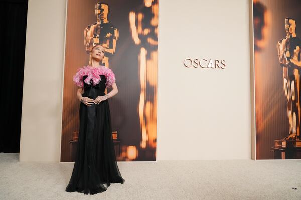 Ariana Grande arrives at the Oscars Nominees Dinner on Tuesday, Feb. 25, 2025, at the Academy Museum of Motion Pictures in Los Angeles. (Photo by Jordan Strauss/Invision/AP)