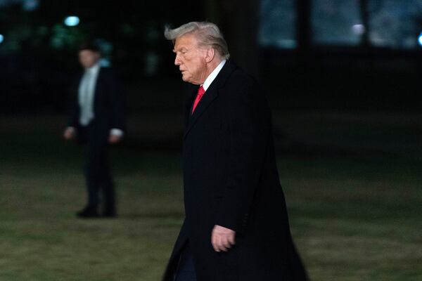 President Donald Trump arrives on the South Lawn of the White House, in Washington, Monday, Feb. 10, 2025. (AP Photo/Jose Luis Magana)