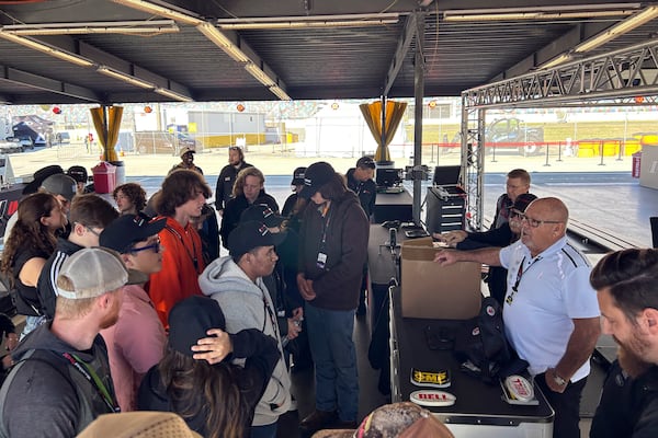 Students from two Volusia County high schools visit Daytona International Speedway, Friday, Jan. 17, 2025, in Daytona Beach, Fla., for an immersive experience that showed what opportunities there are for them in motorsports. (AP Photo/Jenna Fryer)