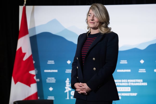 Canadian Foreign Minister Melanie Joly awaits the arrival of U.S. Secretary of State Marco Rubio for a bilateral meeting on the sidelines of the G7 foreign ministers meeting in La Malbaie, Quebec, Thursday, March 13, 2025. (Saul Loeb/Pool via AP)