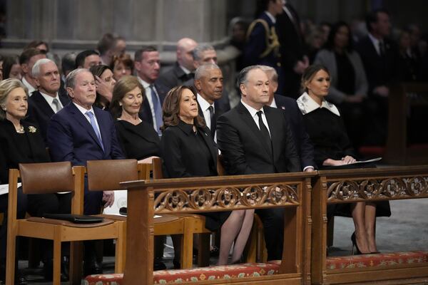 Vice President Kamala Harris, second gentleman Doug Emhoff, former First Lady Hillary Clinton, former President George W. Bush, former first lady Laura Bush, former President Barack Obama, former President and President-elect Donald Trump, former first lady Melania Trump, former Vice President Mike Pence and others, attend the state funeral for former President Jimmy Carter at Washington National Cathedral in Washington, Thursday, Jan. 9, 2025. (AP Photo/Ben Curtis)