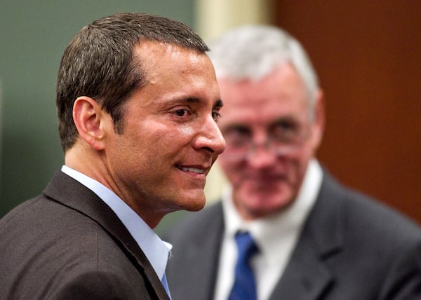 FILE - James Arthur Ray stands with defense attorney Thomas Kelly, right, before his criminal trial, March 17, 2011 in Camp Verde, Ariz. (AP Photo/Tom Tingle, File)