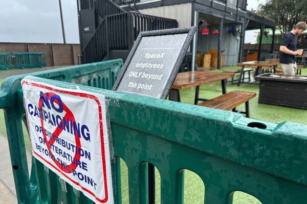 Voting signs are posted Saturday, May 3, 2025, outside a polling station in the town of Boca Chica, Texas, that would become Starbase, Texas, if local residents approve a measure to make the home of Elon Musk's SpaceX its own city. (AP Photo/Valerie Gonzalez)