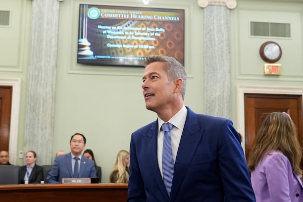 Former Wisconsin Rep. Sean Duffy, R-Wis., arrives to testify before the Senate Commerce, Science, and Transportation Committee on Capitol Hill in Washington, Wednesday, Jan. 15, 2025, for his nomination to be Transportation Secretary. (AP Photo/Susan Walsh)