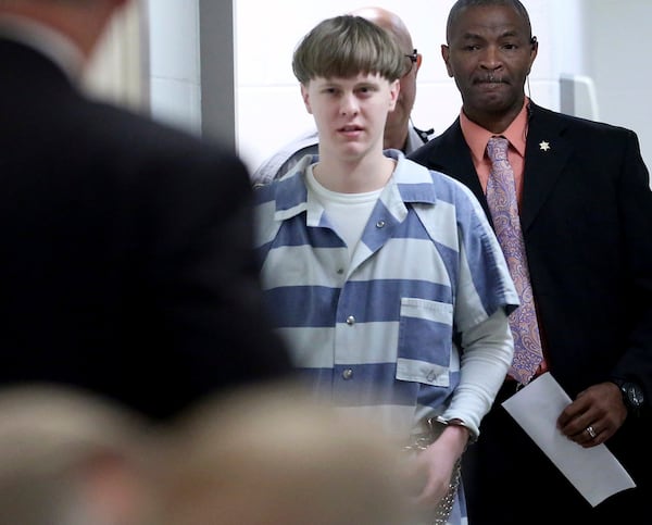 FILE - Dylann Roof enters the court room at the Charleston County Judicial Center on April 10, 2017, in Charleston, S.C. (Grace Beahm/The Post And Courier via AP, Pool, File)