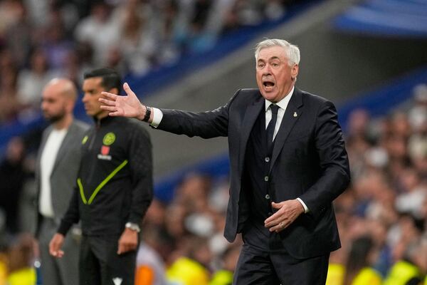 Real Madrid's head coach Carlo Ancelotti reacts during the Spanish La Liga soccer match between Real Madrid and Celta Vigo at the Santiago Bernabeu stadium in Madrid, Spain, Sunday, May 4, 2025. (AP Photo/Jose Breton)