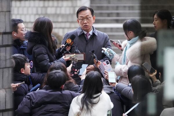 Seok Dong-hyeon, one of lawyers for South Korea's impeached President Yoon Suk Yeol, speaks to the media upon his arrival at the Seoul Central District Court in Seoul, South Korea, Thursday, Jan. 16, 2025. (AP Photo/Lee Jin-man)