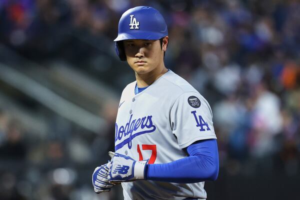 Los Angeles Dodgers' Shohei Ohtani stands on the field during the third inning of a baseball game against the New York Mets Friday, May 23, 2025, in New York. (AP Photo/Pamela Smith)