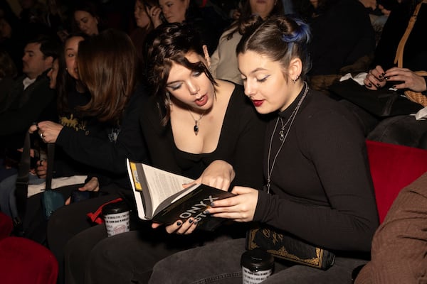 Audience members attend author Rebecca Yarros in conversation of her new book "Onyx Storm" at The Town Hall on Friday, Jan. 24, 2025, in New York. (Photo by CJ Rivera/Invision/AP)