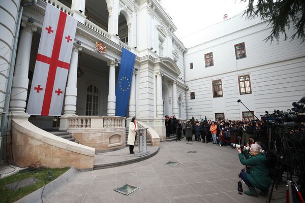 Outgoing Georgian President Salome Zourabichvili holds a press conference outside the Orbeliani Palace, the official residence of the President of Georgia, in Tbilisi, Georgia, Sunday, Dec. 29, 2024. (AP Photo/Zurab Tsertsvadze)