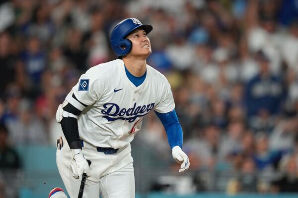 Los Angeles Dodgers' Shohei Ohtani heads to first for a solo home run during the sixth inning of a baseball game against the New York Yankees, Friday, May 30, 2025, in Los Angeles. (AP Photo/Mark J. Terrill)