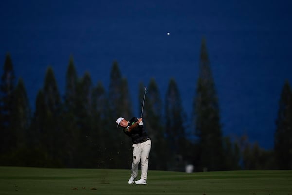 Sungjae Im hits on the fourth hole during the final round of The Sentry golf event, Sunday, Jan. 5, 2025, at Kapalua Plantation Course in Kapalua, Hawaii. (AP Photo/Matt York)