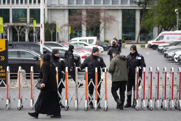 Police have cordons off the area around City Hall following the arrest of Istanbul mayor Ekrem Imamoglu, in Istanbul, Turkey, Wednesday, March 19, 2025.(AP Photo/Francisco Seco)