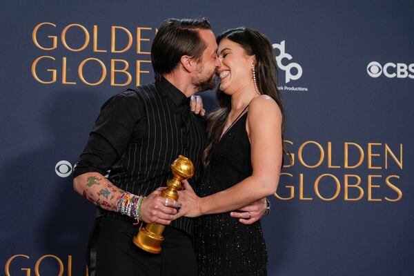 Kieran Culkin, right, winner of the award for best performance by an actor in a supporting role in any motion picture for "A Real Pain" poses with Jazz Charton during the 82nd Golden Globes on Sunday, Jan. 5, 2025, at the Beverly Hilton in Beverly Hills, Calif. (AP Photo/Chris Pizzello)