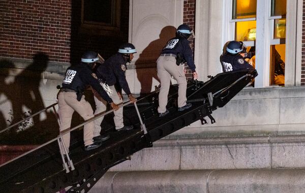 FILE - Using a tactical vehicle, New York City police enter an upper floor of Hamilton Hall on the Columbia University campus in New York, Tuesday, April 30, 2024, after the building was taken over by protesters earlier in the day. (AP Photo/Craig Ruttle, File)