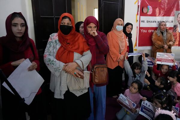 Afghan refugees attend a meeting to discuss situation after President Donald Trump paused the U.S. refugee programs, in Islamabad, Pakistan, Friday, Jan. 24, 2025. (AP Photo/Anjum Naveed)