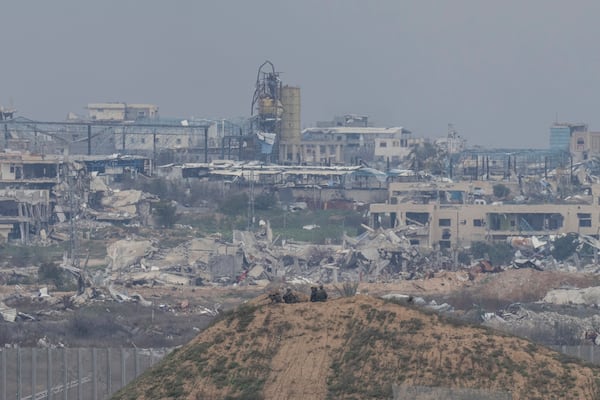 Israeli soldiers take positions near the border with Gaza in southern Israel, Sunday, Feb. 9, 2025. (AP Photo/Ohad Zwigenberg)