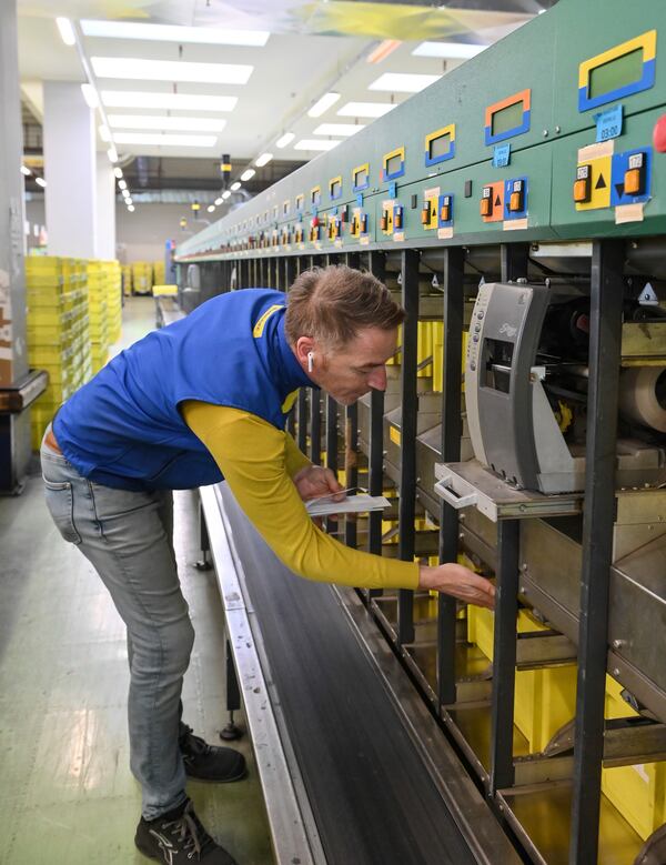 Letters addressed to Pope Francis are sorted at Leonardo da Vinci International Airport's postal sorting center in Fiumicino some 30 kilometers south-west of Rome, Wednesday, March 19, 2025. (AP Photo/Chris Warde-Jones)