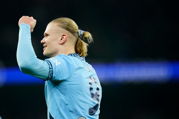 Manchester City's Erling Haaland celebrates after scoring his sides first goal during the Champions League playoff first leg soccer match between Manchester City and Real Madrid at the Etihad Stadium in Manchester, England, Tuesday, Feb. 11, 2025. (AP Photo/Dave Thompson)