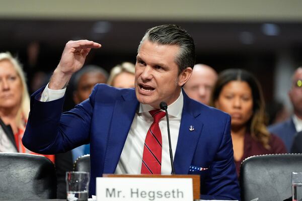 Pete Hegseth, President-elect Donald Trump's choice to be Defense secretary, appears before the Senate Armed Services Committee for his confirmation hearing, at the Capitol in Washington, Tuesday, Jan. 14, 2025. (AP Photo/Alex Brandon)