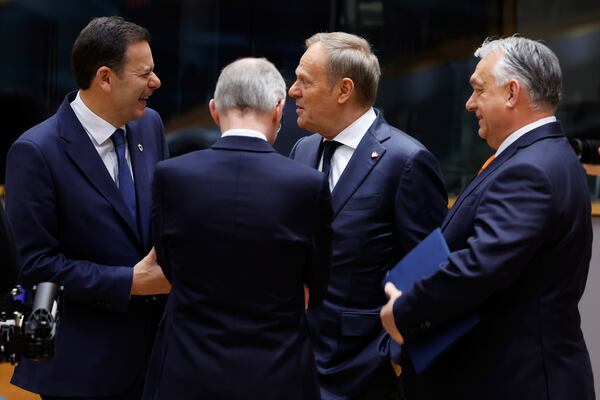 From left, Portugal's Prime Minister Luis Montenegro, Poland's Prime Minister Donald Tusk and Hungary's Prime Minister Viktor Orban during a round table meeting at an EU Summit in Brussels, Thursday, March 6, 2025. (AP Photo/Geert Vanden Wijngaert)