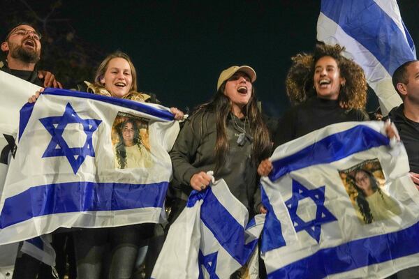 Israelis celebrate the release of three hostages who had been held captive by Hamas in Gaza as they gather in Tel Aviv, Israel, Sunday, Jan. 19, 2025. (Photo/Ariel Schalit)