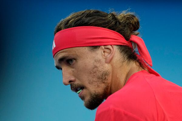 Alexander Zverev of Germany reacts during a break in his men's singles final against Jannik Sinner of Italy at the Australian Open tennis championship in Melbourne, Australia, Sunday, Jan. 26, 2025. (AP Photo/Ng Han Guan)