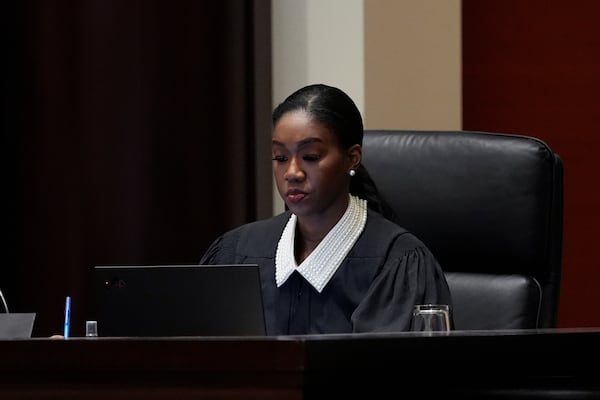 Michigan Supreme Court Justice Kyra Harris Bolden listens to oral arguments at the Michigan Hall of Justice, Wednesday, Dec. 4, 2024, in Lansing, Mich. (AP Photo/Carlos Osorio)