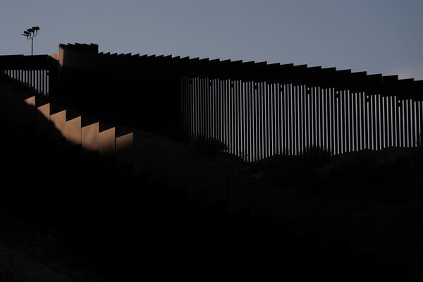 Two walls separate Mexico from the United States along the border Tuesday, Jan. 28, 2025, in Tijuana, Mexico. (AP Photo/Gregory Bull)