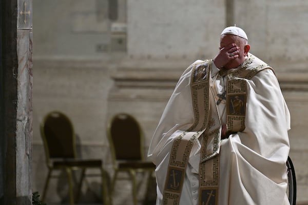 Pope Francis opens the Holy Door of St Peter's Basilica to mark the start of the Catholic Jubilee Year, at the Vatican, Dec. 24, 2024. (Alberto Pizzoli/Pool Photo via AP)