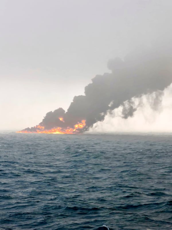 This image provided by Bartek Śmiałek shows smoke billowing from a vessel after a cargo ship hit a tanker carrying jet fuel off eastern England on Monday, March 10, 2025 setting both ablaze and sending fuel pouring into the North Sea. (Bartek Śmiałek via AP)