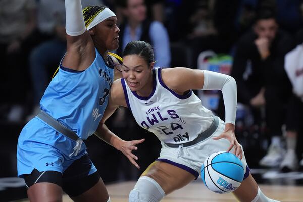 Mist's Aaliyah Edwards (3) defends Lunar Owls Napheesa Collier (24) during the first half of the Unrivaled inaugural basketball game Friday, Jan. 17, 2025, in Medley, Fla. (AP Photo/Brittany Peterson)