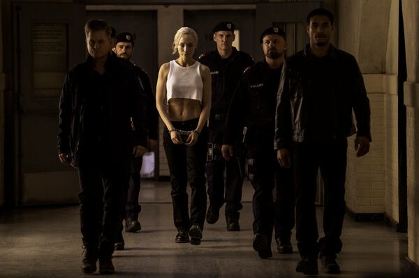 This image shows Shea Whigham, from left, Pom Klementieff, and Greg Tarzan Davis in a still from the film "Mission: Impossible - The Final Reckoning." (Paramount Pictures via AP)