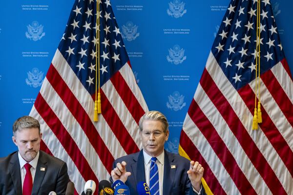 U.S. Trade Representative Jamieson Greer, left, and U.S. Secretary of the Treasury Scott Bessent take part in a press conference after two days of closed-door discussions on trade between the United States and China, in Geneva, Switzerland, Monday, May 12, 2025. (Jean-Christophe Bott/Keystone via AP)