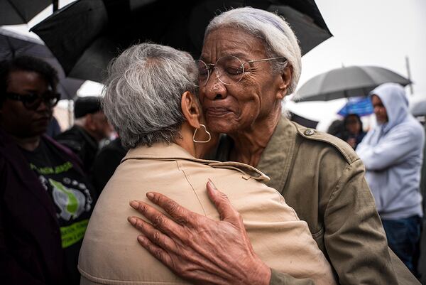 Amina Baraka, mother of Newark Mayor Ras J. Baraka, hugs Rep. Bonnie Watson Coleman, D-N.J., outside of an ICE office after her son's arrest, Friday, May 9, 2025, in Newark, N.J. (AP Photo/Angelina Katsanis)
