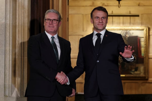 FILE -British Prime Minister Keir Starmer, left, and French President Emmanuel Macron shake hands ahead of a bilateral meeting at Chequers, near Aylesbury, England, Thursday Jan. 9, 2025. (Toby Melville/Pool Photo via AP, File)