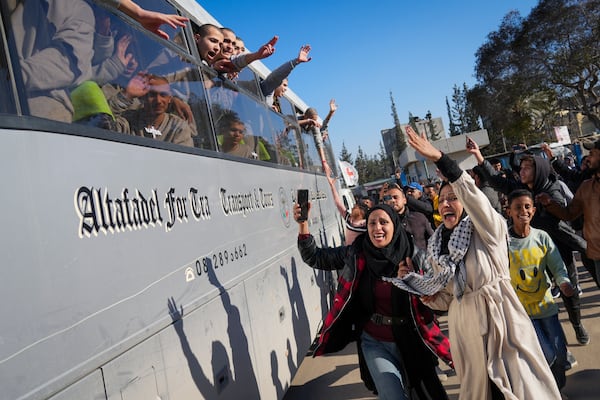 Freed Palestinian detainees are greeted after being released from an Israeli prison following a ceasefire agreement between Hamas and Israel in Khan Younis, Gaza Strip, Thursday, Feb. 27, 2025. (AP Photo/Abdel Kareem Hana)