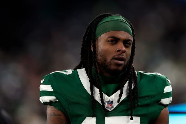 FILE- New York Jets wide receiver Davante Adams (17) reacts during an NFL football game against the Miami Dolphins Sunday, Jan. 5, 2025, in East Rutherford, N.J. (AP Photo/Adam Hunger, file)