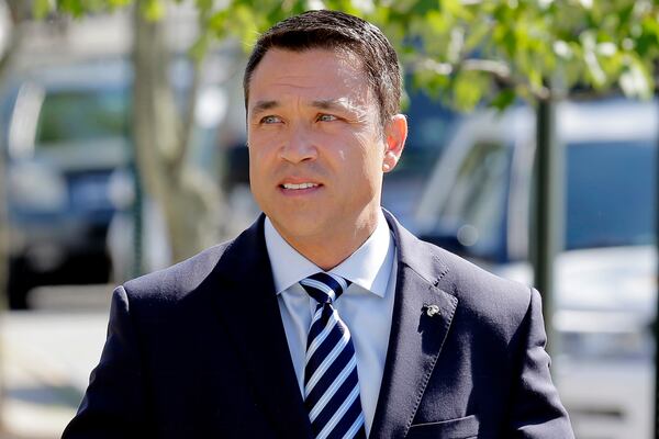 FILE — Former Rep. Michael Grimm arrives to his polling site in the Staten Island borough of New York, June 26, 2018. (AP Photo/Seth Wenig, File)