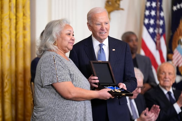 President Joe Biden, right, posthumously presents the Presidential Medal of Freedom, the Nation's highest civilian honor, to Doris Hamer Richardson on behalf of her late aunt Fannie Lou Hamer in the East Room of the White House, Saturday, Jan. 4, 2025, in Washington. (AP Photo/Manuel Balce Ceneta)