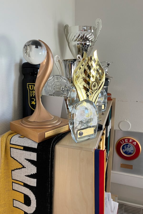 The 2003 and 2004 UEFA Women's Cup trophies rest on a shelf inside the offices of Umeå IK soccer team, next to Umeå Energi Arena in Umeå, Sweden, Monday, March 10, 2025. (AP Photo/Steve Douglas)