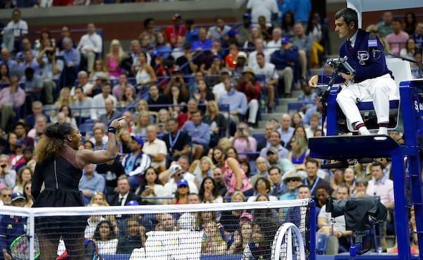 FILE - Serena Williams argues with chair umpire Carlos Ramos during a match against Naomi Osaka, of Japan, in the women's final of the U.S. Open tennis tournament on Sept. 8, 2018, in New York. (AP Photo/Julio Cortez, File)