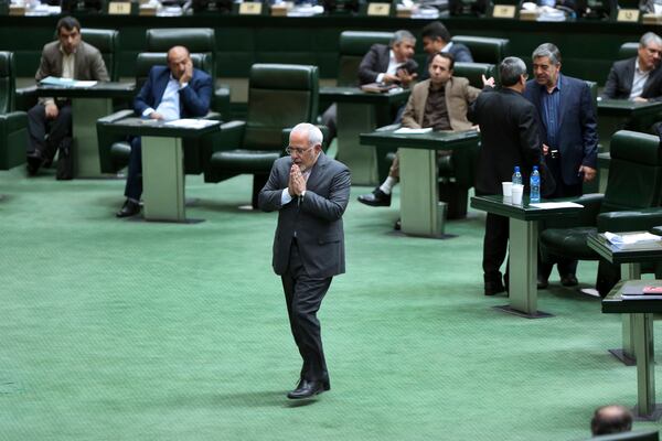 FILE - Iranian Foreign Minister Mohammad Javad Zarif walks to the podium during an open session of parliament in Tehran, Iran, Oct. 2, 2016. (AP Photo/Vahid Salemi, File)