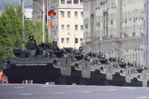 Russian BMP-2 infantry fighting vehicles roll along the Garden Ring after the Victory Day military parade general rehearsal in Moscow, Russia, Wednesday, May 7, 2025. (AP Photo/Dmitry Serebryakov)