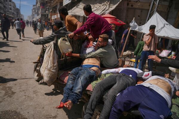 Bodies of some of the victims of an Israeli army strike on a restaurant, which killed at least 29 people, are transported from the scene to a hospital in Gaza City, Wednesday, May 7, 2025.(AP Photo/Jehad Alshrafi)