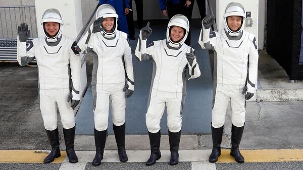 Crew10 members, from left, cosmonaut Kirill Peskov, astronaut Nichole Ayers, astronaut Anne McClain and JAXA astronaut Takuya Onishi leave the Operations and Checkout building before heading to Launch Pad 39-A at the Kennedy Space Center in Cape Canaveral, Fla., for a mission to the International Space Station in Cape Canaveral, Fla., Friday, March 14, 2025. (AP Photo/John Raoux)