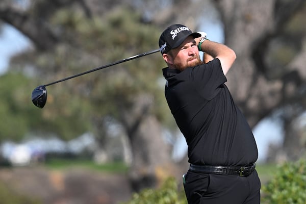 Shane Lowry hits his tee shot on the fifth hole of the South Course at Torrey Pines during the first round of the Farmers Insurance Open golf tournament Wednesday, Jan. 22, 2025, in San Diego. (AP Photo/Denis Poroy)