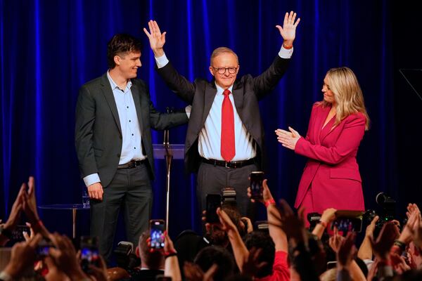 Australian Prime Minister Anthony Albanese, his partner Jodie Haydon and son Nathan react as they meet the party faithful after winning a second term following the general election in Sydney, Saturday, May 3, 2025. (AP Photo/Rick Rycroft)