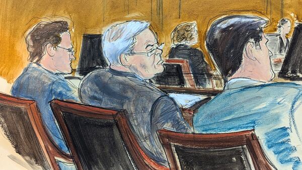 In this courtroom sketch, former Sen. Bob Menendez, center, flanked by defense attorneys Avi Weitzman, left, and Adam Fee, listens during his sentencing on a bribery conviction in Manhattan federal court, Wednesday, Jan. 29, 2025, in New York.(Elizabeth Williams via AP)