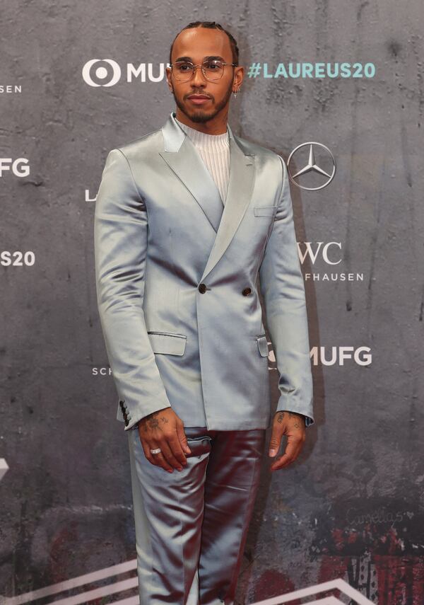 FILE - British reigning F1 drivers champion Lewis Hamilton arrives for the 2020 Laureus World Sports Awards in Berlin, Germany, Monday, Feb. 17, 2020. (AP Photo/Michael Sohn, File)
